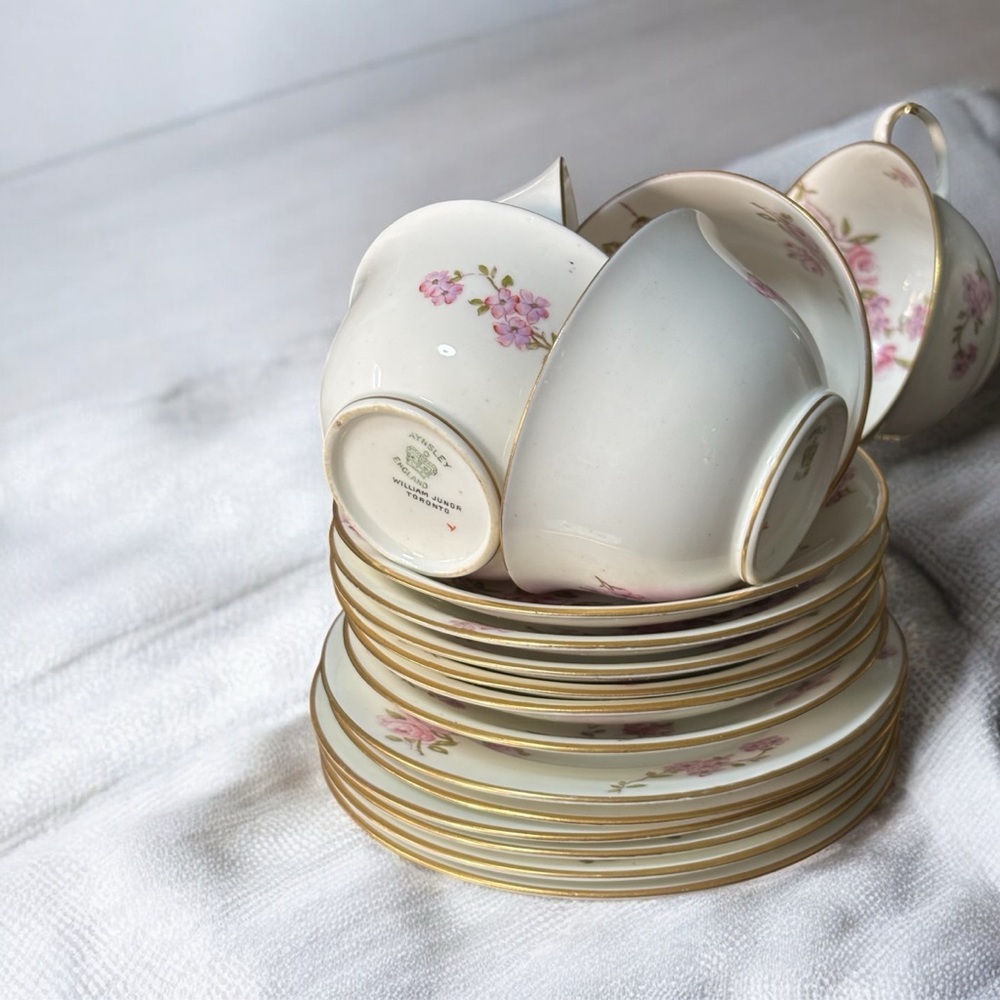 Five Trios of Aynsley Teacups. ‘June Bouquet”.  Each Set Sold Separately.